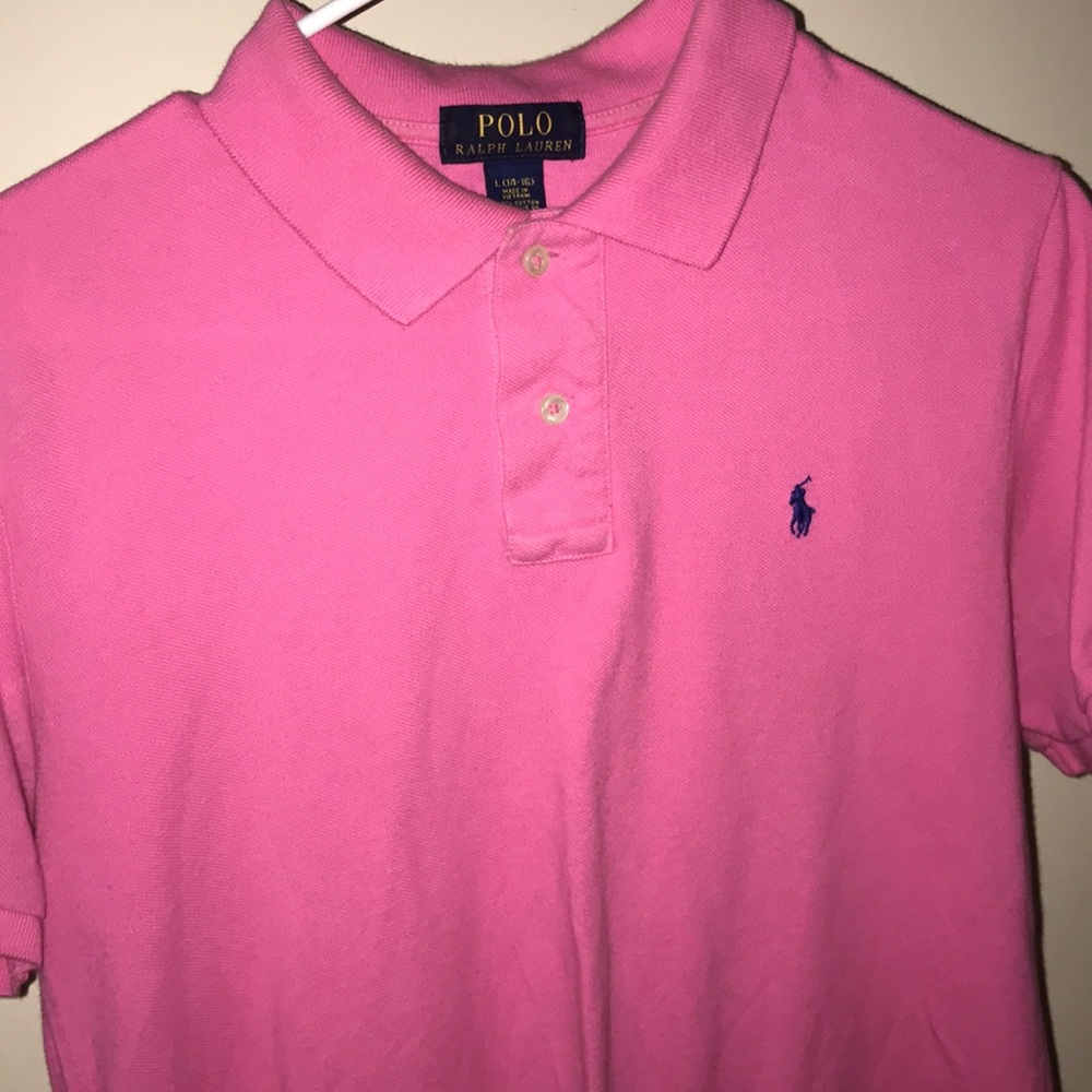 Pink polo shirt.